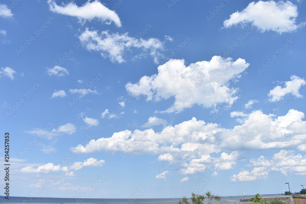 Beautiful seascape with blue sky and white clouds