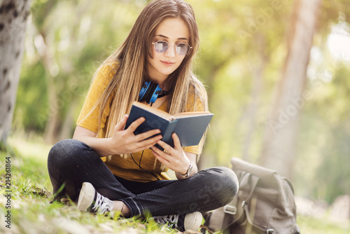 Reading a book at park