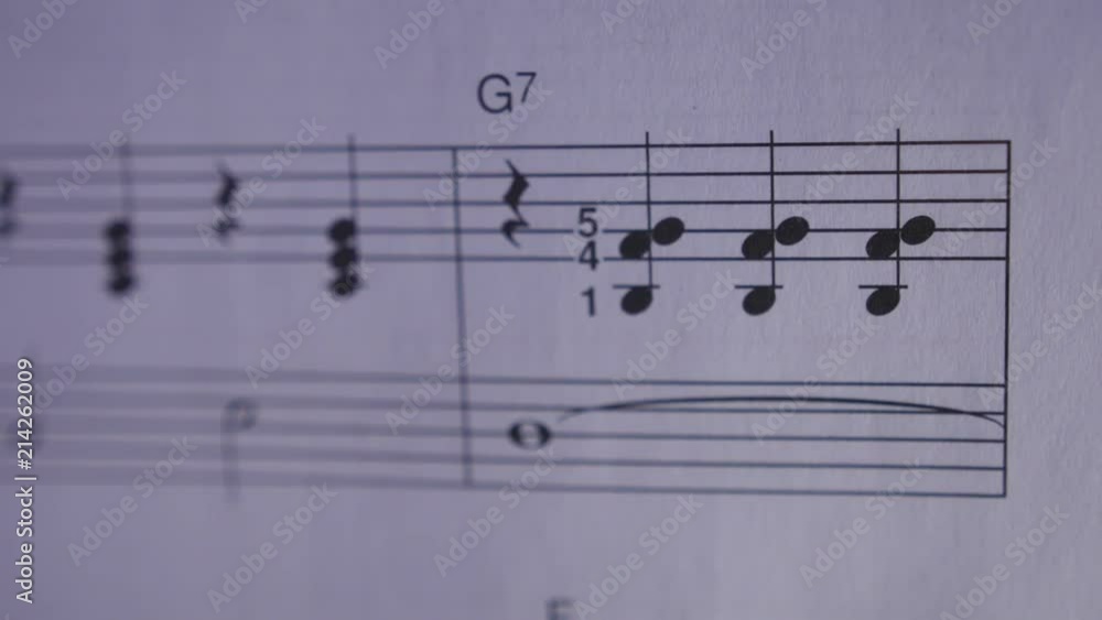 Slider Shot of Music Notes on Sheet Music Slider Shot of Music Notes on Sheet Music