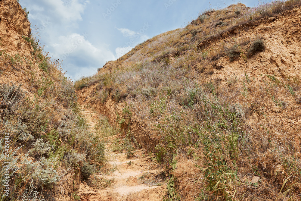 path near the high sea shore, beautiful coastal landscape, travel concept