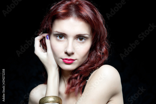 Head of beautiful woman with red hair