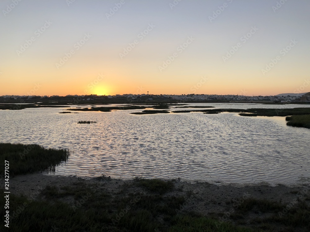 Fototapeta premium Sunset at Ria Formosa, Faro, Portugal 
