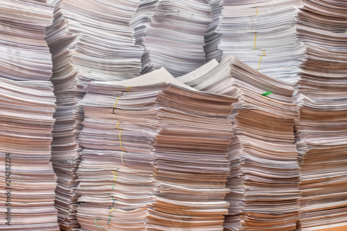 pile of paper documents in the office