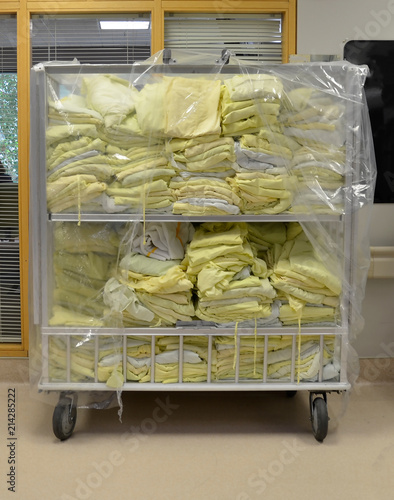 Stacks of Hospital Laundry and  Linen Piled Up