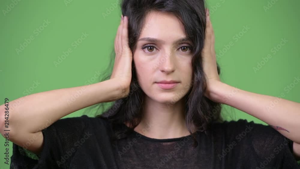Young beautiful woman showing three wise monkeys concept Young beautiful woman showing three wise monkeys concept