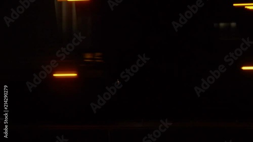 Christ is the Answer sign and cross on a busy highway at night