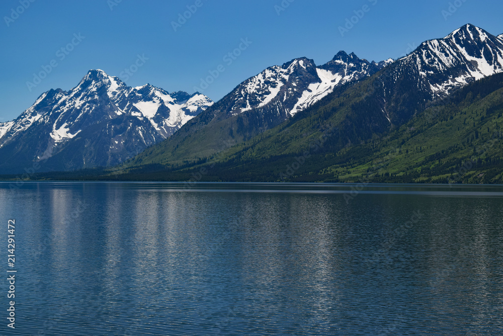 Teton range with reflections of the peaks in Jackson lake