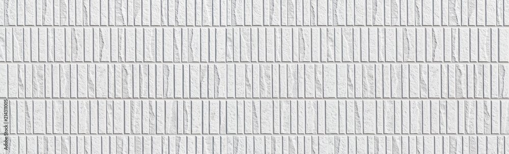 Fototapeta premium Panorama of Modern white stone tile wall pattern and seamless background