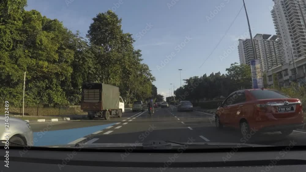 Petaling jaya, selangor, malaysia - 20 July 2018. Full HD Time lapse with Point Of View from car dashboard driving in traffic on daylight. malaysia road. HQ ProRes HD Petaling jaya, selangor, malaysia - 20 July 2018. Full HD Time lapse with Point Of View from car dashboard driving in traffic on daylight. malaysia road. HQ ProRes HD