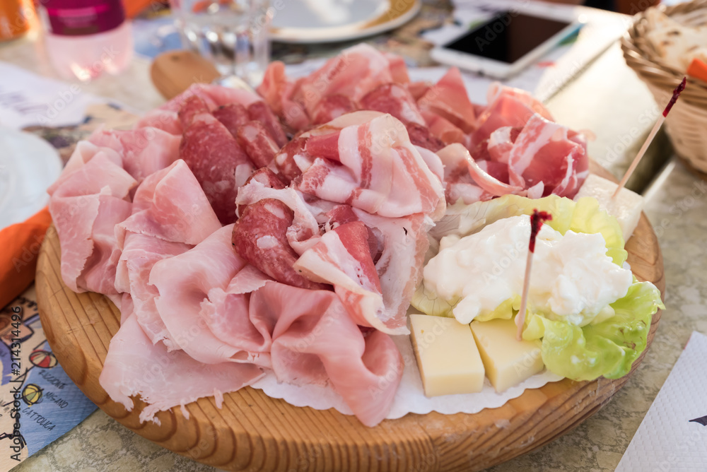 Typical Italian salami and cheese Typical Italian salami and cheese