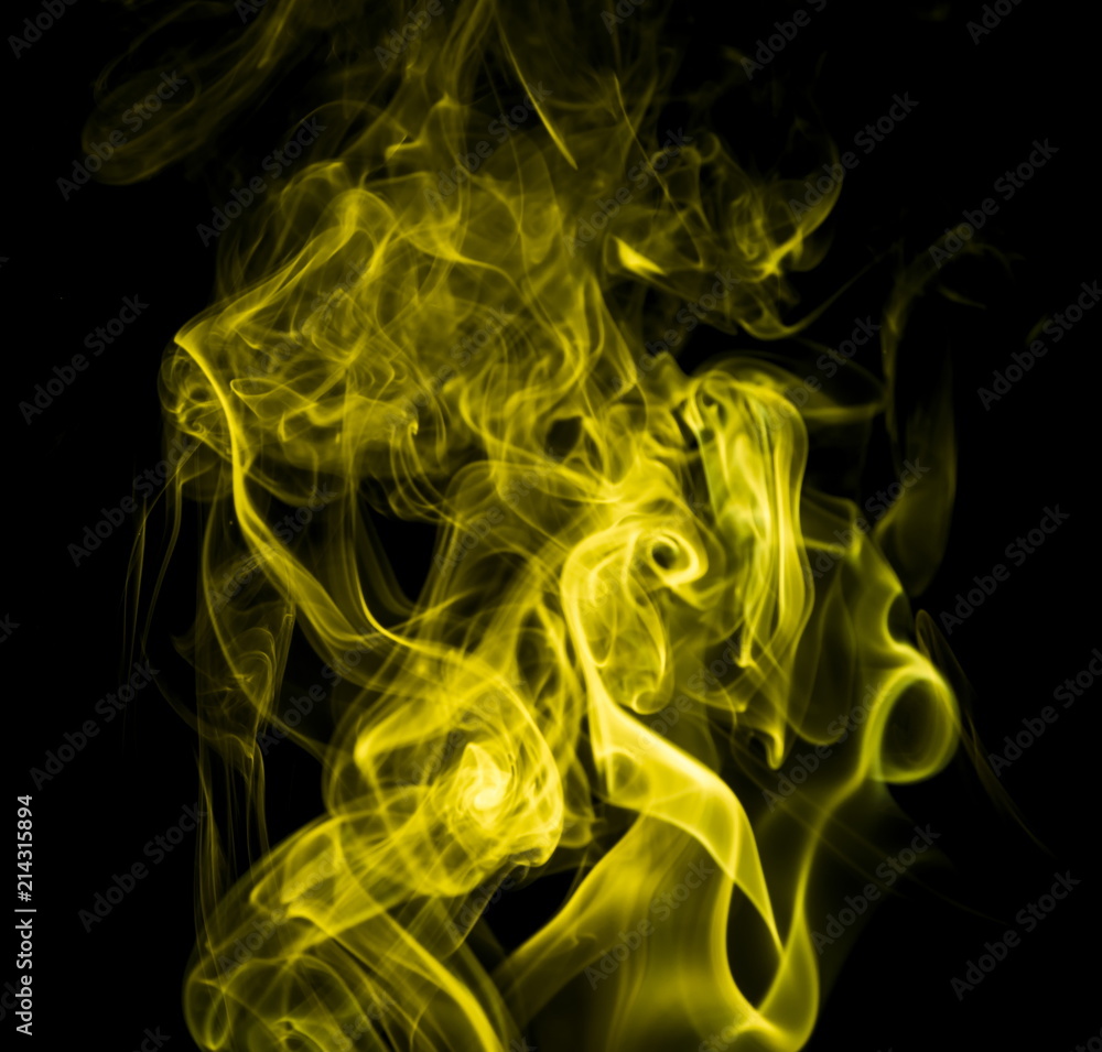 Yellow smoke on black background Yellow smoke on black background