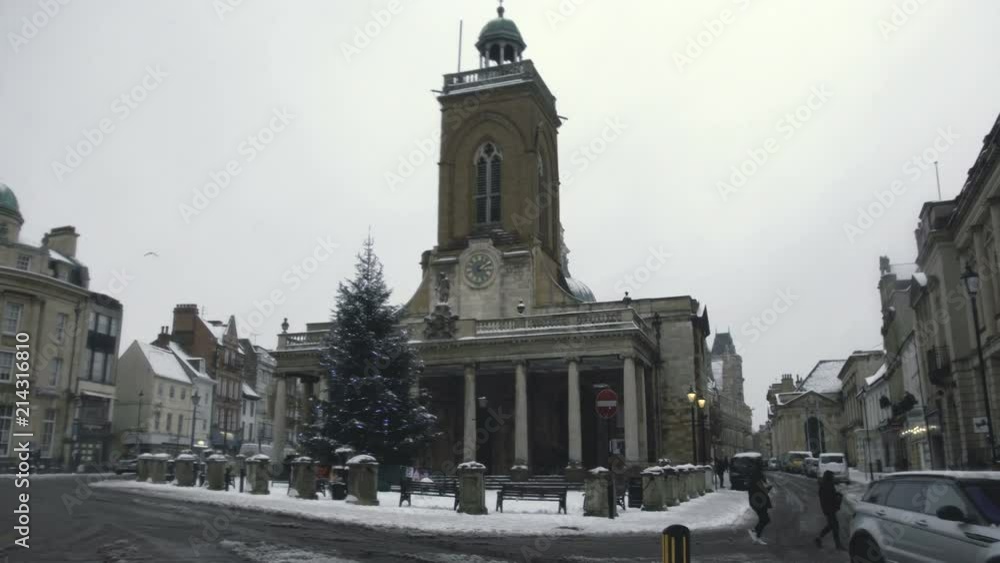UNITED KINGDOM, NORTHAMPTON - JANUARY 18, 2018: Snow in Northampton, All Saints in winter, United Kingdom, Northampton UNITED KINGDOM, NORTHAMPTON - JANUARY 18, 2018: Snow in Northampton, All Saints in winter, United Kingdom, Northampton