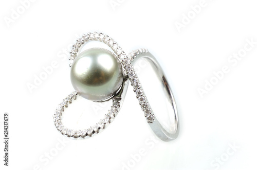 Pearl ring on white background