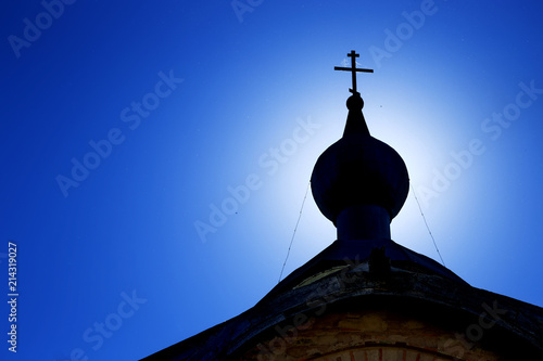 Christian church with Cross on the top on a blue sky. Paraskeva Pyatnitsa Church in Veliky Novgorod (Novgorod the Great), Russia.