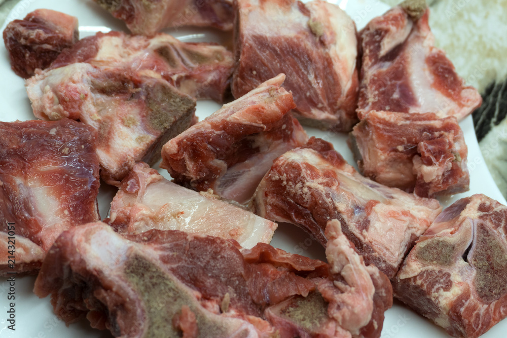 Raw dog bones isolated on white background Animal food.