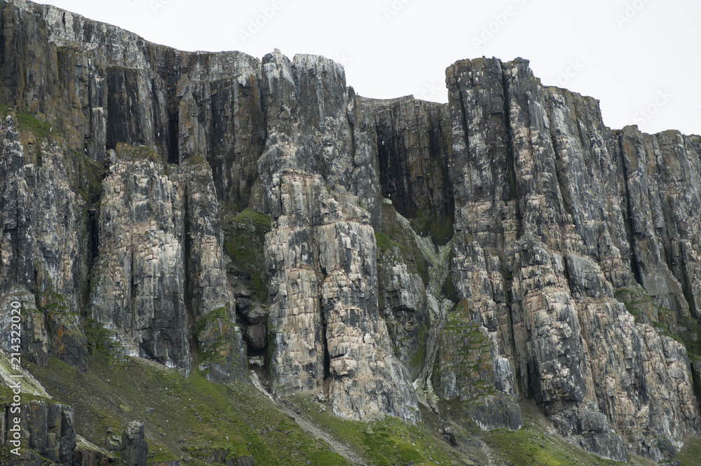 Magnificent view of a rock mountain cliff in the Arctic