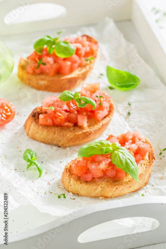 Crisp and fresh bruschetta with tomato and basil