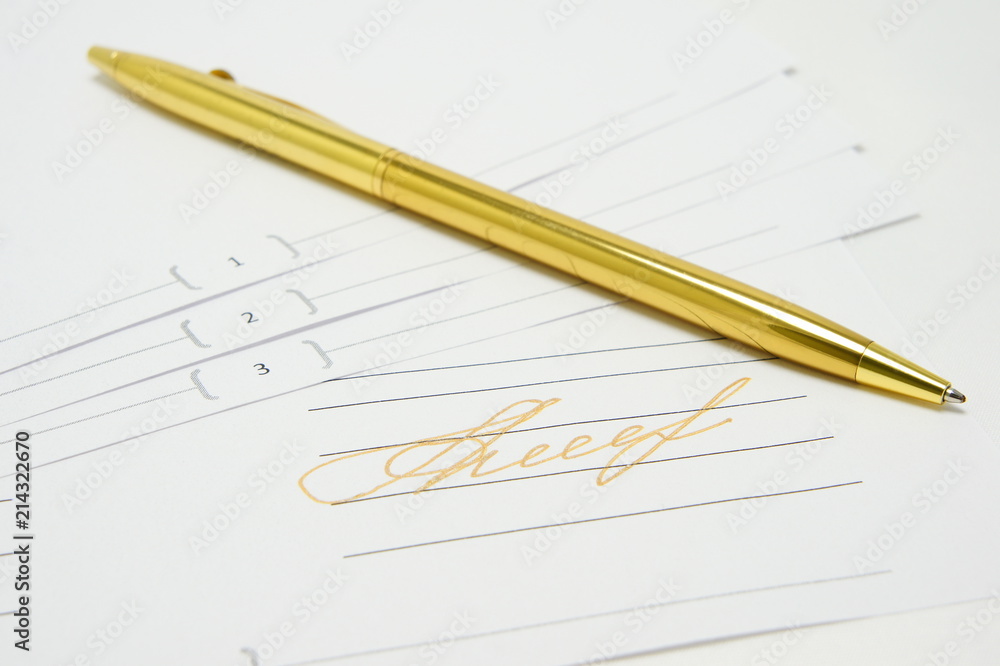Gold signature. Golden pen lying on the document. Gold signature. Golden pen lying on the document.
