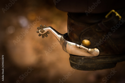 Tableau sur toile Metal spur on stockman book shallow depth of field