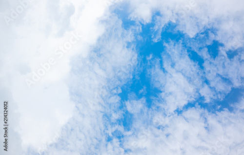 clear blue sky with white clouds on good weather.blue sky on sunlight background.skyscape.cloudscape.beautiful vast blue sky and fluffy clouds with some space.
