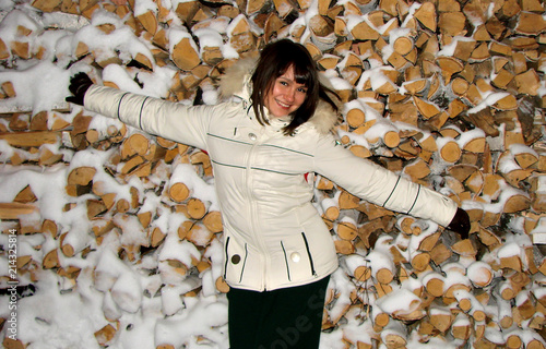 Young girl on a background of wood. Russia, Omsk region photo