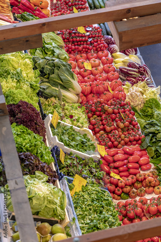 fresh vegetables, salad, onions tomatoes offered at the Kleinmarkthalle photo