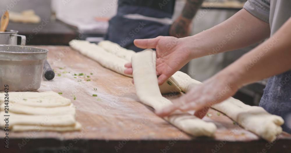 Chef making grill sesame bread in restaurant