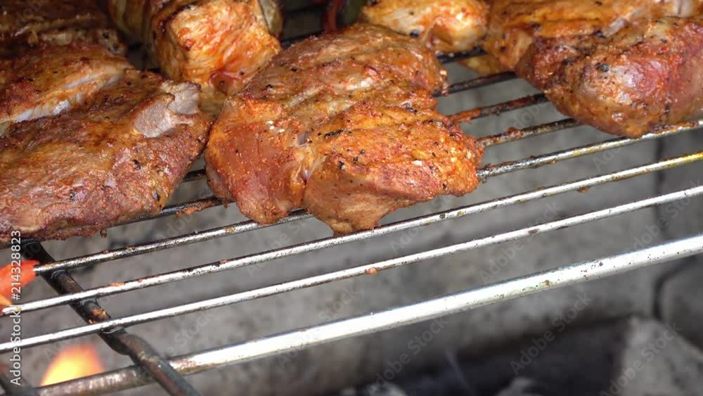 Slow Motion of meat on barbecue fire