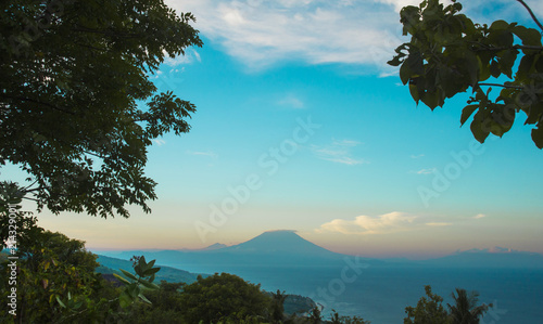 amazing beautiful scenic view of active volcano Mount Agung in Bali island of Indonesia on sunset in Asia travel destination and Summer holidays trip