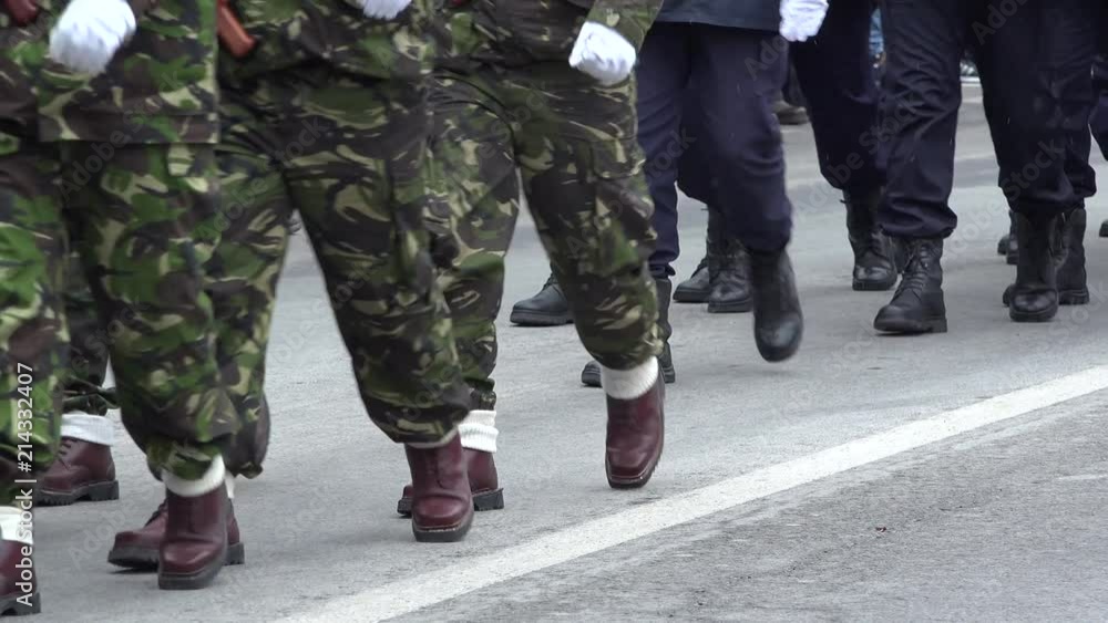 Legs walking at military parade, patriotic ceremony Legs walking at military parade, patriotic ceremony