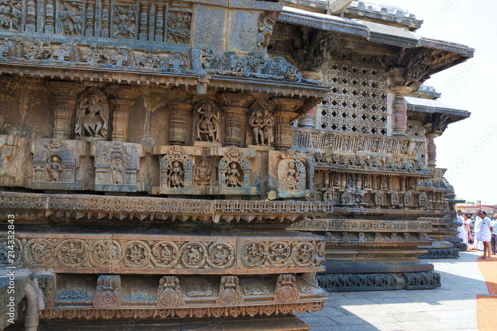 Prforated windows, decorative friezes with deities, dancers and other figures, Chennakeshava temple. Belur, Karnataka. South West view.