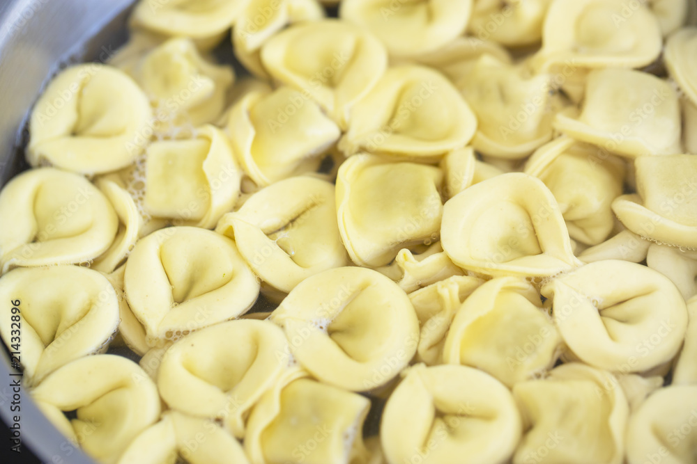 Cooking ravioli, fresh pasta Italian Cooking in water. Cooking ravioli, fresh pasta Italian Cooking in water.