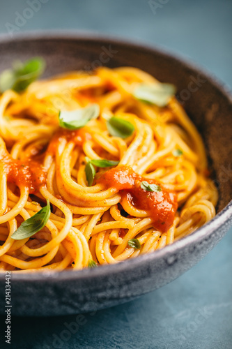 Italian pasta with tomato sauce in bowl