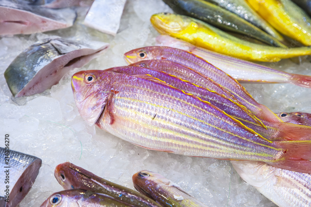 whole fresh fishes are offered in the fish marke whole fresh fishes are offered in the fish marke