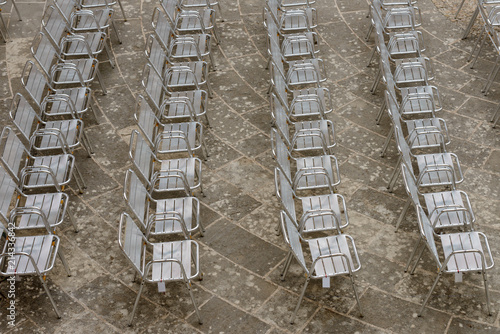metal chairs arranged in a row