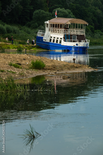 The old ship moored on the bank of the river Oka.