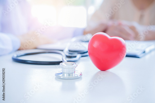 Red heart with stethoscope. Concept healthcare.