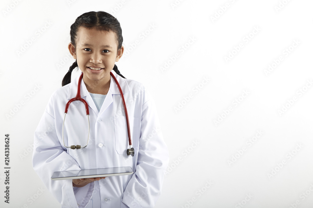 Cute Asian little girl in doctor costume Cute Asian little girl in doctor costume