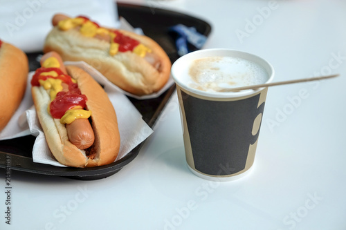 The-dogs, sauce, ketchup, coffee with milk in a Cup. Latte photo