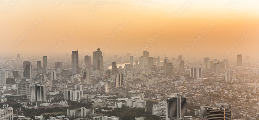 View across Bangkok skyline showing in sunset