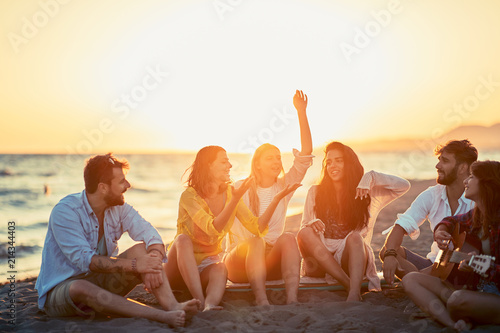 Friends having a great time together at the beach.