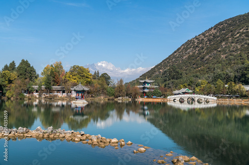 Lijiang old town,China. scene-Black Dragon Pool Park. . In the there, you can see Jade Dragon Snow Mountain.