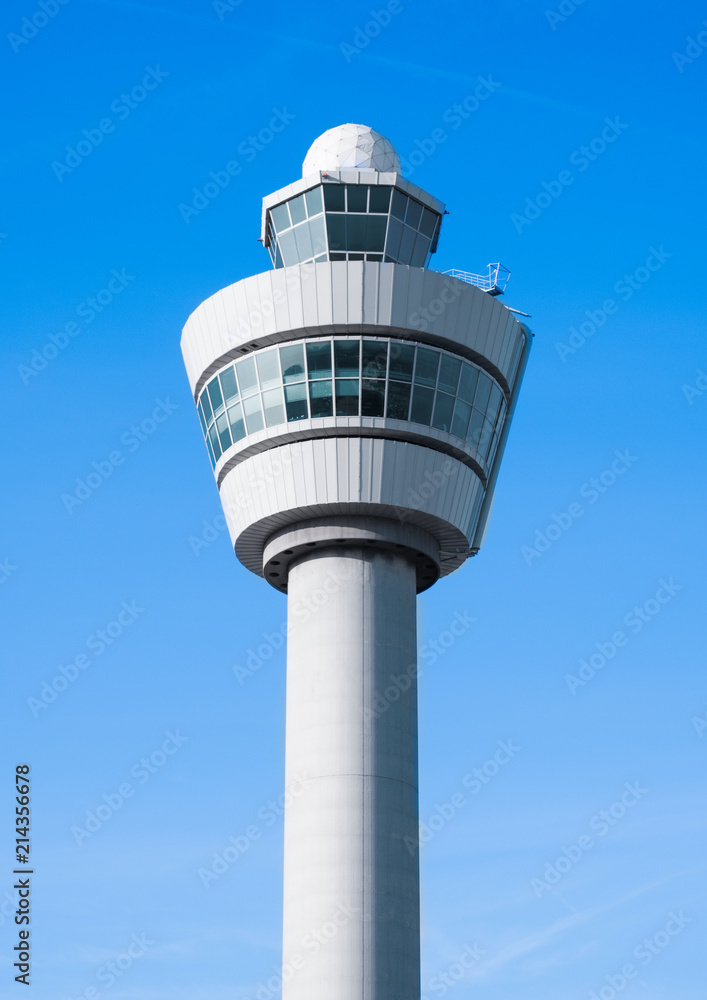 Flight control tower on blue sky background Flight control tower on blue sky background