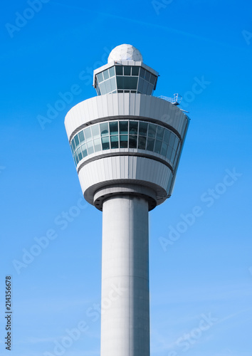 Flight control tower on blue sky background