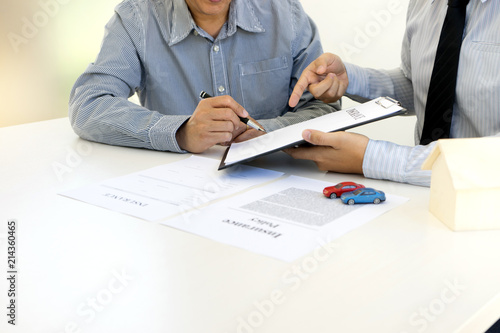 Young Business man insurance agent show document contract