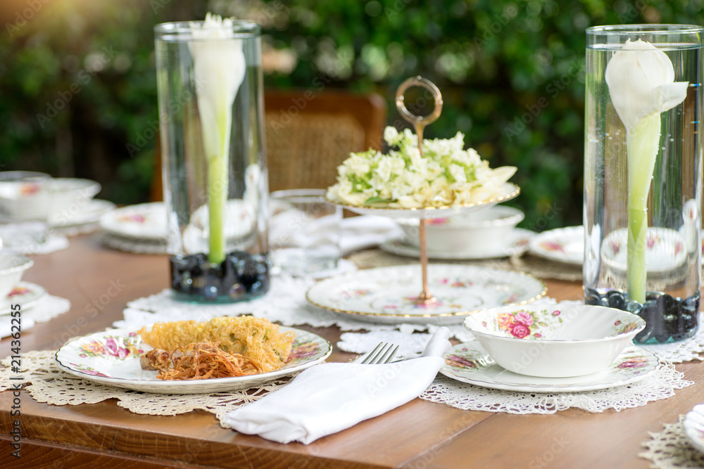 Asia food table setting with flower open air