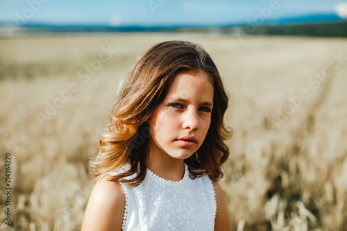 Portrait of a girl. Photo session in the field