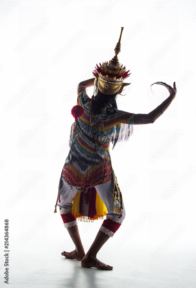 The lady in Southern thai classical dancing suit is posing on white background.