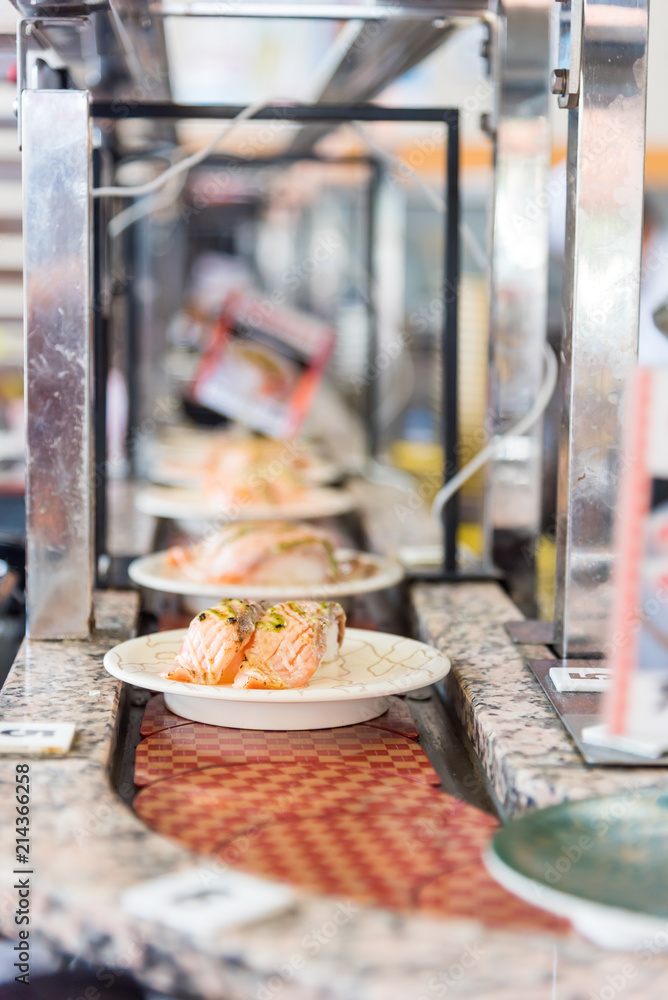 japan Food on conveyor or belt buffet of sushi in restaurant with