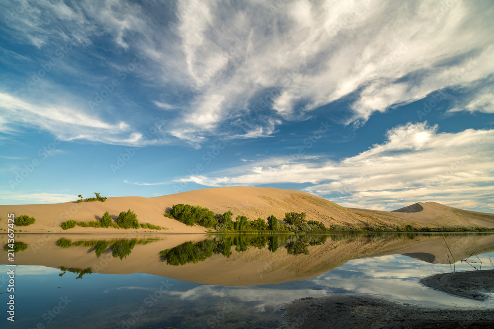 Reflection with clouds in a lake at Bruneau Sand Dunes State Park Idaho Reflection with clouds in a lake at Bruneau Sand Dunes State Park Idaho